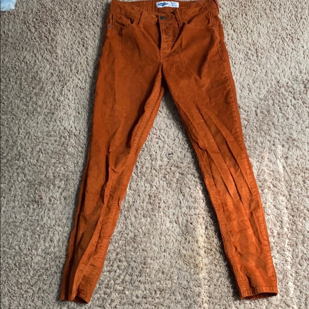 Darker orange high rise skinny jeans